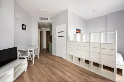 Łóżko lub łóżka w pokoju w obiekcie New Varsovia Comfort 828 by BookingHost
