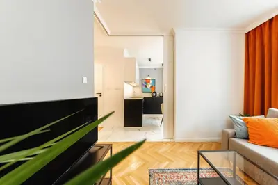 Telewizja i/lub zestaw kina domowego w obiekcie Nowolipki - Apartament w Centrum - 55m2, szybkie WI-FI & TV