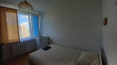 Łóżko lub łóżka w pokoju w obiekcie Ivory House (Marymont-Ruda)