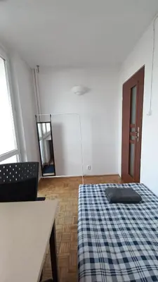 Łóżko lub łóżka w pokoju w obiekcie Ivory House (Marymont-Ruda)