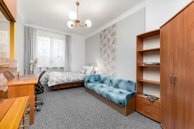 Łóżko lub łóżka w pokoju w obiekcie Dąbrowszczaków 6 by Homeprime