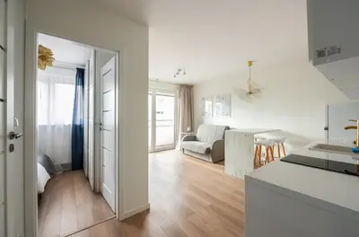 Łóżko lub łóżka w pokoju w obiekcie Chmielna Marble City Centre Apartment by BookingHost