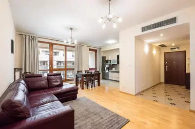 Część wypoczynkowa w obiekcie Wilanów Violet Apartment by BookingHost
