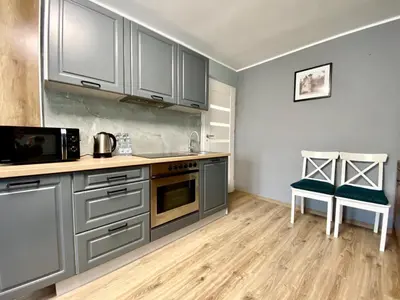 Kuchnia lub aneks kuchenny w obiekcie K22 Al Jana Pawła II Apartments 1