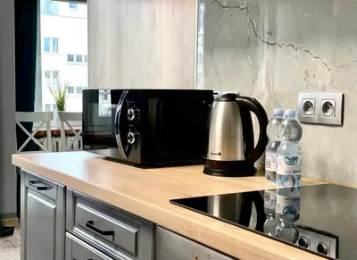 Kuchnia lub aneks kuchenny w obiekcie K22 Al Jana Pawła II Apartments 1
