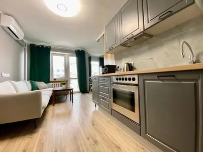 Kuchnia lub aneks kuchenny w obiekcie K22 Al Jana Pawła II Apartments 1