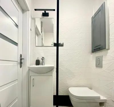 Łazienka w obiekcie K22 Al Jana Pawła II Apartments 1
