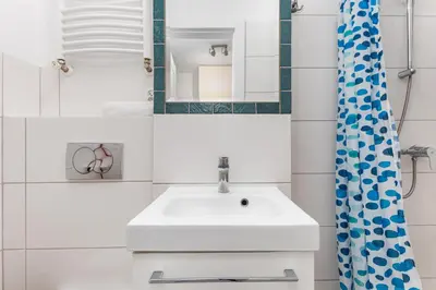 Łazienka w obiekcie Broniewskiego 24A by Homeprime