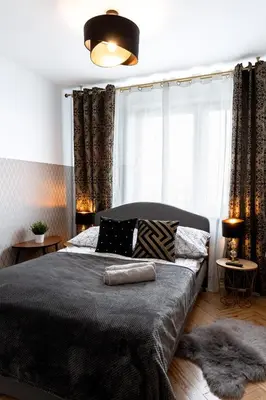 Łóżko lub łóżka w pokoju w obiekcie ClickTheFlat Conrada Apart Rooms