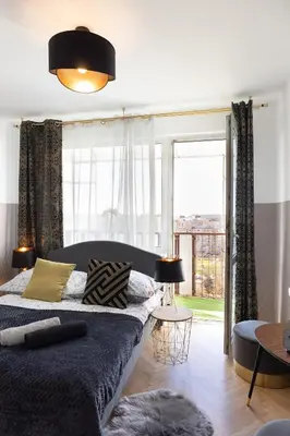 Łóżko lub łóżka w pokoju w obiekcie ClickTheFlat Conrada Apart Rooms
