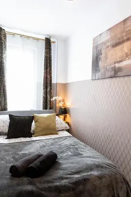 Łóżko lub łóżka w pokoju w obiekcie ClickTheFlat Conrada Apart Rooms