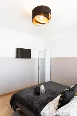 Łóżko lub łóżka w pokoju w obiekcie ClickTheFlat Conrada Apart Rooms
