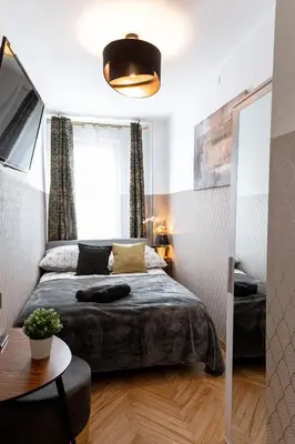 Łóżko lub łóżka w pokoju w obiekcie ClickTheFlat Conrada Apart Rooms