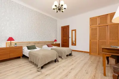 Łóżko lub łóżka w pokoju w obiekcie Vintage Apartments Warsaw Praga by Noclegi Renters