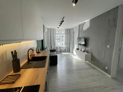 Telewizja i/lub zestaw kina domowego w obiekcie Vienne Appartment 90