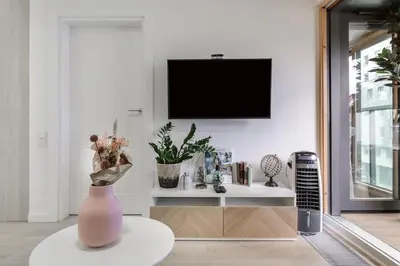 Telewizja i/lub zestaw kina domowego w obiekcie Lumina luxury apartments in Mennica Residence