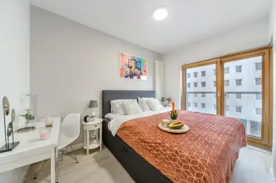 Łóżko lub łóżka w pokoju w obiekcie Lumina luxury apartments in Mennica Residence