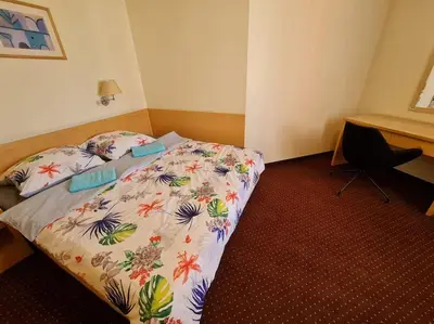 Łóżko lub łóżka w pokoju w obiekcie 10Q - Z6 Apartament 701