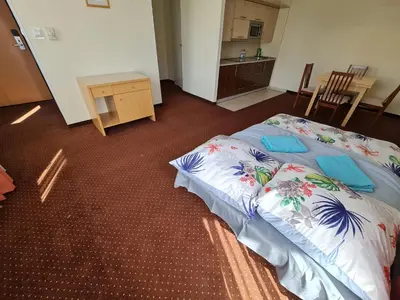 Łóżko lub łóżka w pokoju w obiekcie 10Q - Z6 Apartament 701