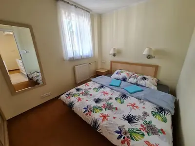 Łóżko lub łóżka w pokoju w obiekcie 10Q - Z6 Apartament 705