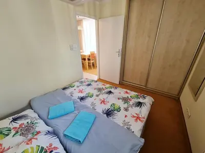 Łóżko lub łóżka w pokoju w obiekcie 10Q - Z6 Apartament 705