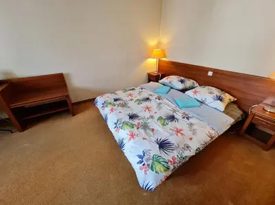 Łóżko lub łóżka w pokoju w obiekcie 10Q - Z6 Apartament 706