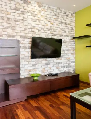 Telewizja i/lub zestaw kina domowego w obiekcie Wilanów Luxury Green Apartment by BookingHost