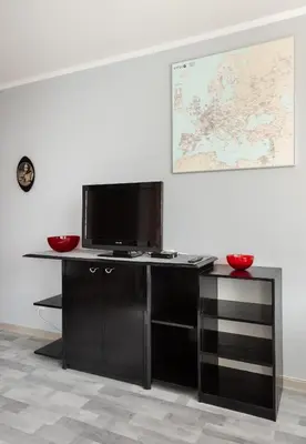 Telewizja i/lub zestaw kina domowego w obiekcie Praga-Południe Divine Apartment by BookingHost