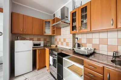 Kuchnia lub aneks kuchenny w obiekcie Praga-Południe Divine Apartment by BookingHost