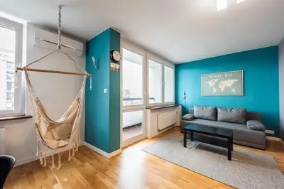 Część wypoczynkowa w obiekcie Ratusz Arsenał Modern City Apartment by BookingHost