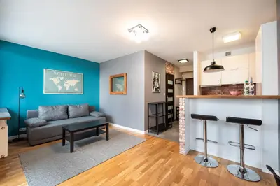 Kuchnia lub aneks kuchenny w obiekcie Ratusz Arsenał Modern City Apartment by BookingHost