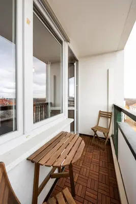 Balkon lub taras w obiekcie Ratusz Arsenał Modern City Apartment by BookingHost