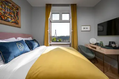 Łóżko lub łóżka w pokoju w obiekcie Sava Boutique Hotel