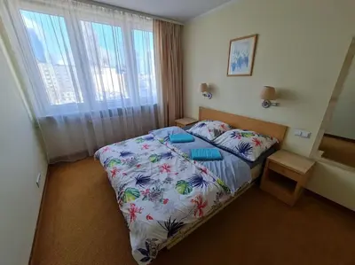 Łóżko lub łóżka w pokoju w obiekcie 10Q - Z6 Apartament 801