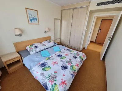 Łóżko lub łóżka w pokoju w obiekcie 10Q - Z6 Apartament 801