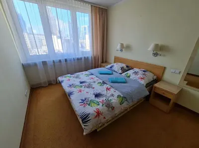 Łóżko lub łóżka w pokoju w obiekcie 10Q - Z6 Apartament 802