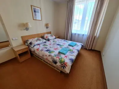 Łóżko lub łóżka w pokoju w obiekcie 10Q - Z6 Apartament 803