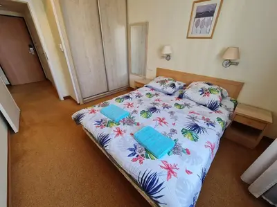 Łóżko lub łóżka w pokoju w obiekcie 10Q - Z6 Apartament 803