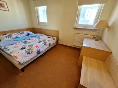 Łóżko lub łóżka w pokoju w obiekcie 10Q - Z6 Apartament 804