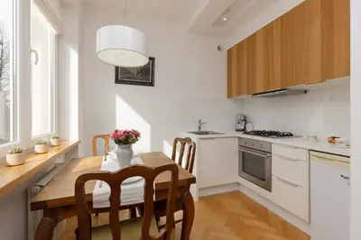 Kuchnia lub aneks kuchenny w obiekcie Koszykowa Sunny Studio by Noclegi Renters