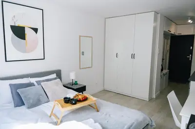Łóżko lub łóżka w pokoju w obiekcie Warsaw Downtown Studio - Top Location, Metro Nearby - by Rentujemy