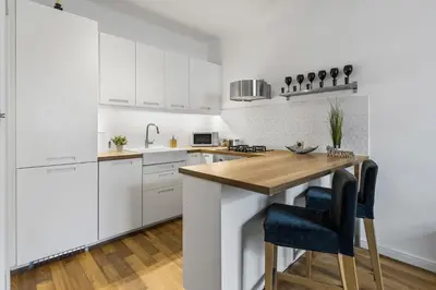 Kuchnia lub aneks kuchenny w obiekcie OldTown Cosy Apartment