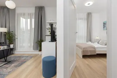 Łóżko lub łóżka w pokoju w obiekcie Oś Królewska - Comfortable Apartment in Wilanów