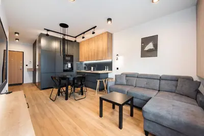 Kuchnia lub aneks kuchenny w obiekcie Żoliborz Obsidian Apartment by BookingHost