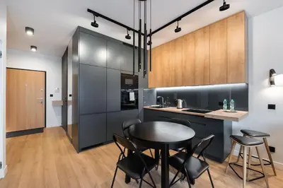 Kuchnia lub aneks kuchenny w obiekcie Żoliborz Obsidian Apartment by BookingHost