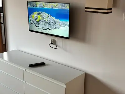 Telewizja i/lub zestaw kina domowego w obiekcie APART WAWA app 38 WiFi 600 Mbit
