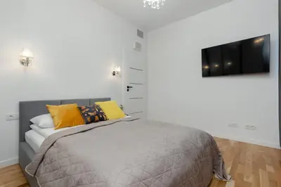 Telewizja i/lub zestaw kina domowego w obiekcie Exceptional Business Apartments by Noclegi Renters