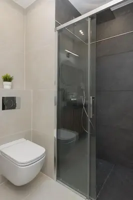 Łazienka w obiekcie Exceptional Business Apartments by Noclegi Renters