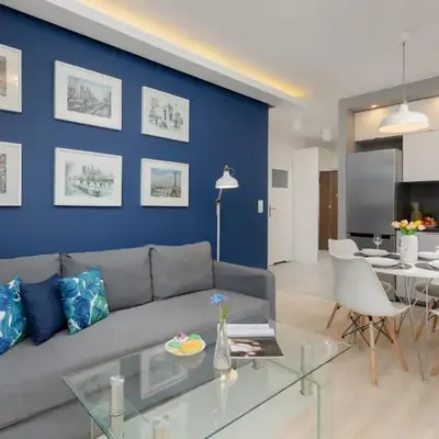 Wola Apartment with Balcony Sokołowska by Noclegi Renters