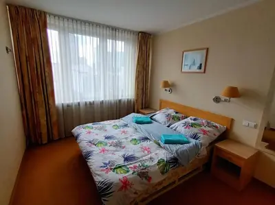 Łóżko lub łóżka w pokoju w obiekcie 10Q - Z6 Apartament 902